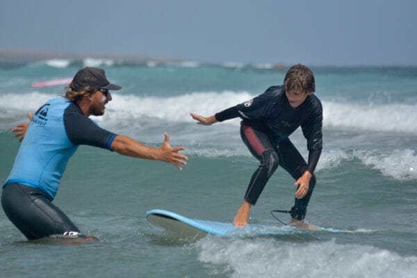 Instructor high-fiving student