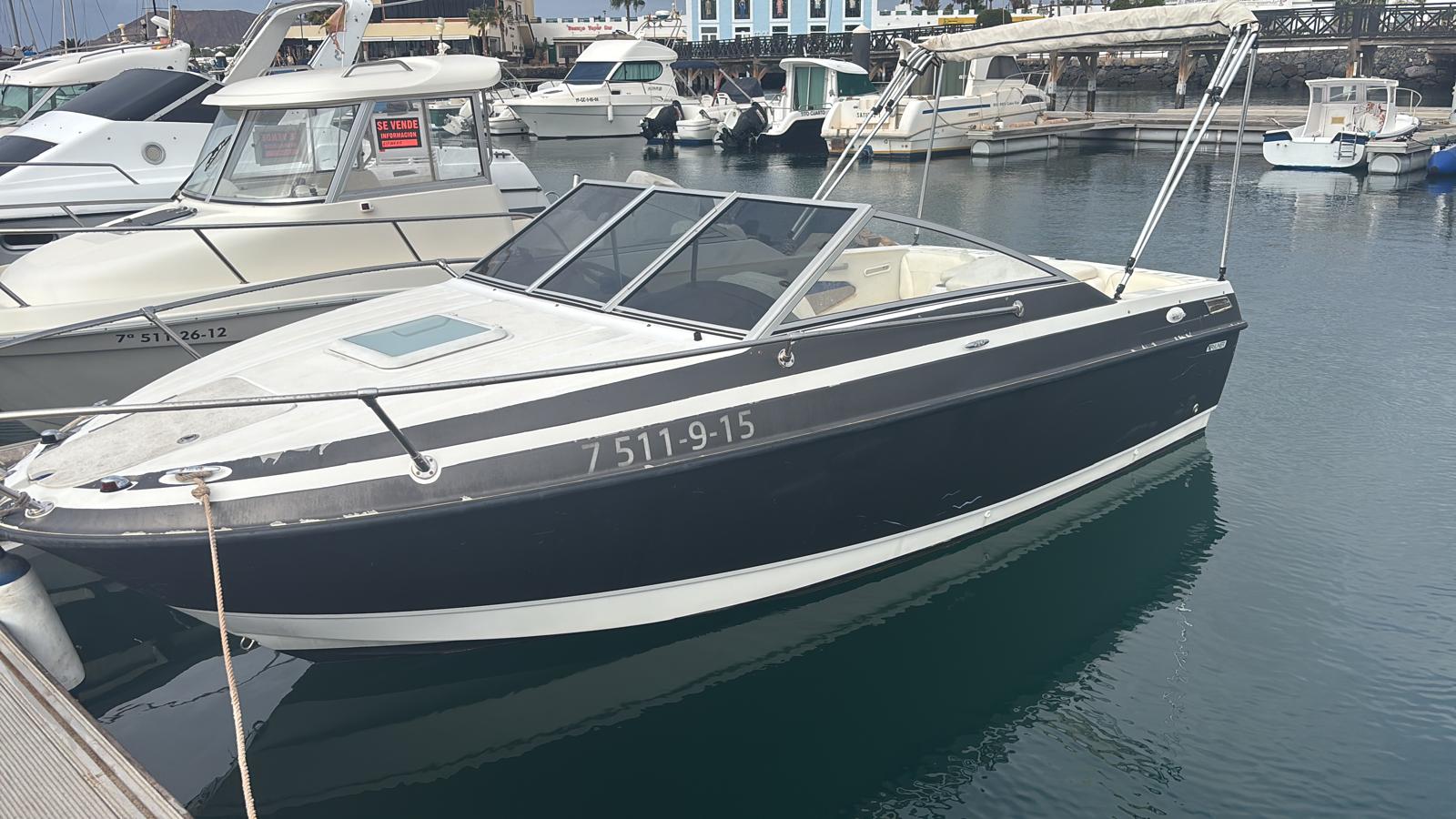 Kaboti Surf boat docked at Playa Blanca marina, Lanzarote