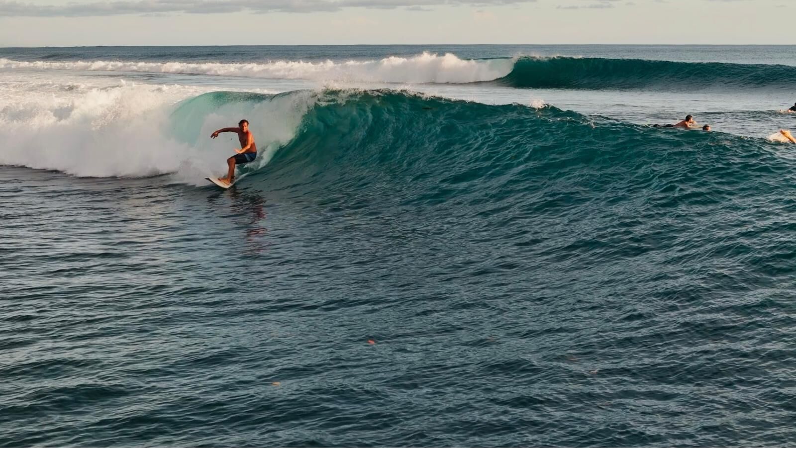 Clean uncrowded wave peeling at sunset, Lanzarote